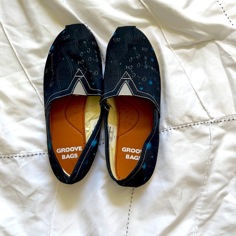 NWOT. Navy blue DNA Slip-ons